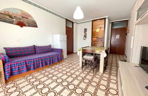 Porto Santa Margherita Apartment | Holiday apartment Apartment with swimming pool surrounded by a garden