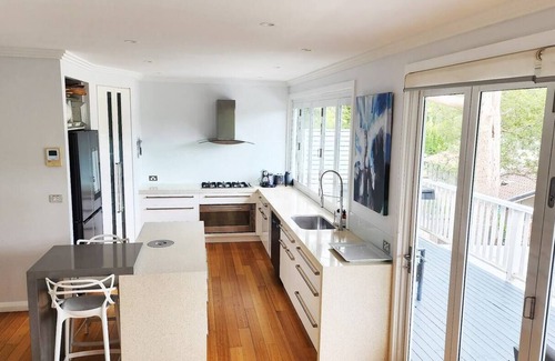Newport House | Family-Friendly Waterfront Escape: Pool, Ocean Views & Fun!