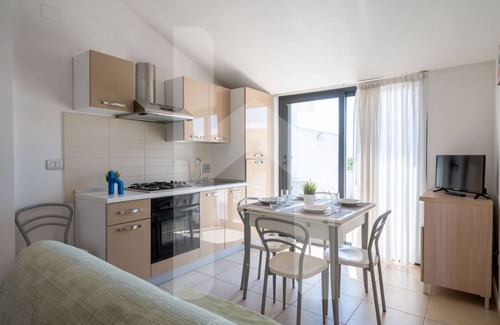 Pineto Apartment | Seaside Comfort at Holiday Rendez Vous: Pool & Pet Friendly