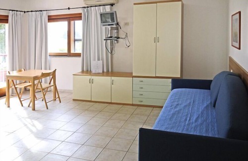 Porto Pollo Apartment | Pet-Friendly Retreat at Holiday Residence Il Nido dei Gabbiani