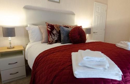 Ryther Cabin | Top-Rated Hollicarrs - Bluebell Lodge with Hot Tub & Kitchen