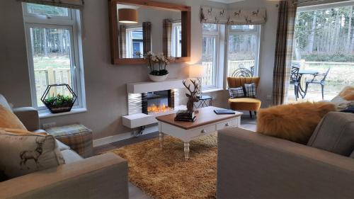 Ryther Cabin | Pet-Friendly Hollicarrs Stag Lodge with Hot Tub & 9.8 Rating