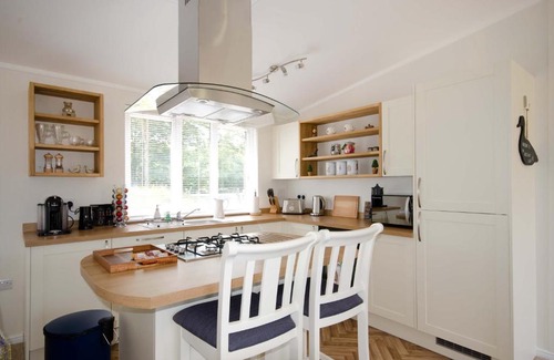 Ryther Cabin | Explore Hollicarrs - Woodland Lodge with Hot Tub & Pets Welcome