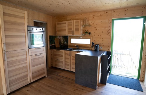 Lichterfeld-Schacksdorf House | Relax at Holzhaus am Bergheider See with Oceanfront Views