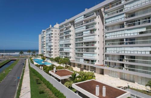 Centro Apartment | Home 12| Ap piscina aquecida pé na areia Bertioga