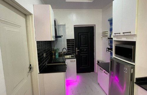 Sagamu Apartment | Welcome to Your Home Away From Home with Pool & Breakfast