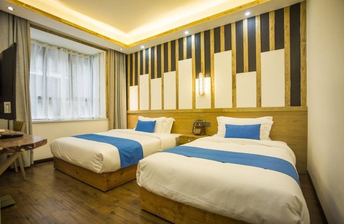 Yongding House | Family-Friendly Getaway at Home Of Heart Inn with Kitchen