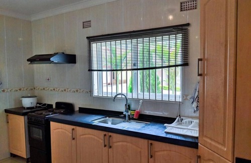 Blantyre House | Budget-Friendly Home Up Guest House with Family Amenities