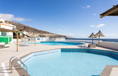 Las Caletillas Apartment | Ocean Breeze Candelaria: Pool, Ocean Views & Family-Friendly