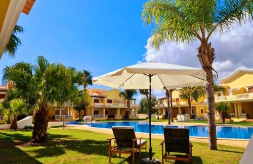 Conceicao e Cabanas de Tavira Villa | Experience Homefield Gardens: Oceanfront Bliss Awaits!