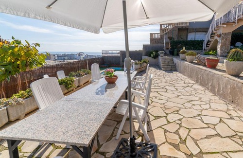 Santa Susanna Villa | Discover HomeHolidaysRentals Formentor: Pet-Friendly Oasis