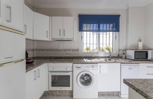 Nerja Apartment | Inviting Apartment with Pool, Ocean Views & Two Large Terraces
