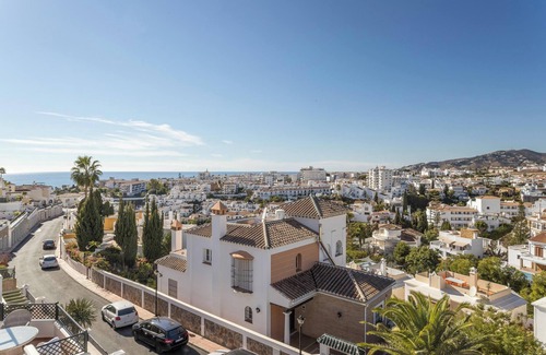 Nerja Apartment | Inviting Apartment with Pool, Ocean Views & Two Large Terraces