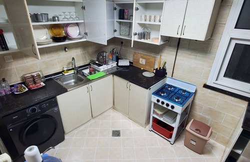 Sharjah Apartment | Homely Hostel - Spacious and clean bedspace in prime location on Al Wahda Street