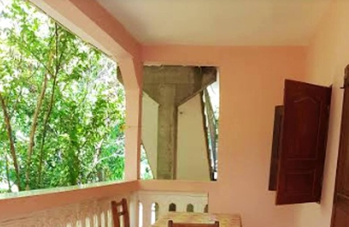 Bandrele Apartment | Homerez - Appartement for 10 ppl. with sea view, garden and terrace at Bandrele