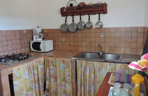 Le Robert Apartment | Homerez - Apt. Central in Le Robert, Garden View.