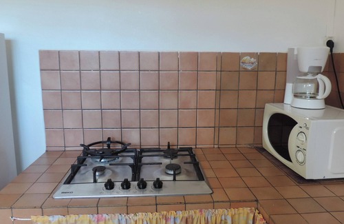 Le Robert Apartment | Homerez - Apt. Central in Le Robert, Garden View.