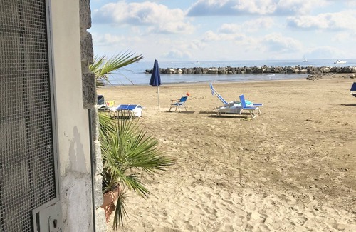 Nettuno Apartment | Beachfront Apartment in Nettuno with Pool and Ocean Views