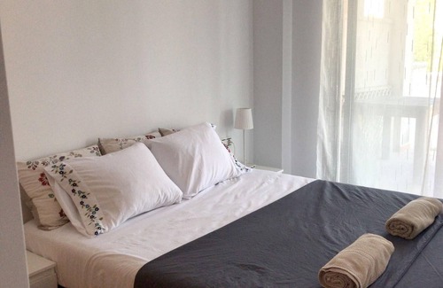 San Jorge Apartment | Relax in a Bright Sant Jordi Apartment with Pool Access