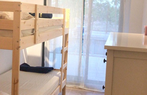 San Jorge Apartment | Relax in a Bright Sant Jordi Apartment with Pool Access