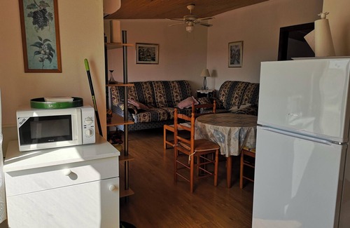 La Siesta Apartment | Cozy Apartment Near the Beach with Shared Pool Access