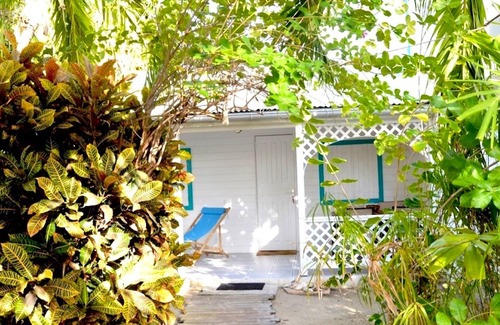Grand-Bourg House | Homerez - Bungalow 700 m away from the beach with shared pool and jacuzzi