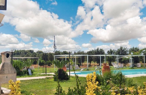 Lizzano House | Homerez - Charming Bungalow in Lizzano with Shared Pool