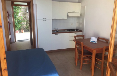 Gioiosa Marea Apartment | Cozy Studio in Calava with Balcony and Ocean View