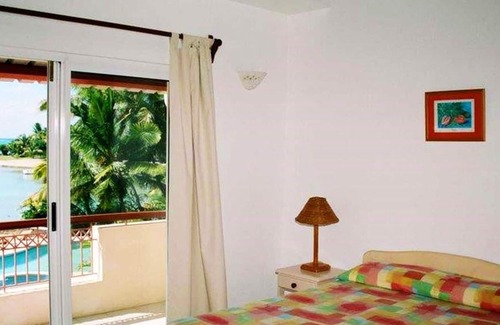 Grand Gaube House | Homerez - House for 6 ppl. with shared pool, sea view and garden at Grand Gaube