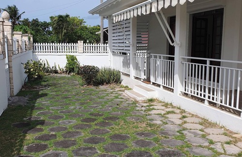 Gros Cap House | Oceanfront Retreat Near Beach with Garden for 6 Guests