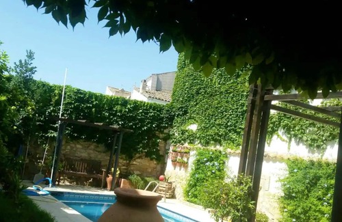 Ubeda House | Homerez - Property for 5 ppl. with shared pool, garden and terrace at Úbeda