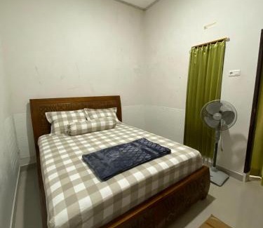 Padang House | Family-Friendly Retreat at Homestay Anugrah Awaits You