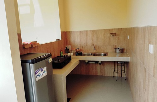 Kutuh Apartment | Relaxing Homestay Steps from Pandawa Beach with Pool