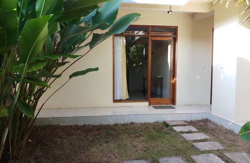 Kutuh Apartment | Relaxing Homestay Steps from Pandawa Beach with Pool