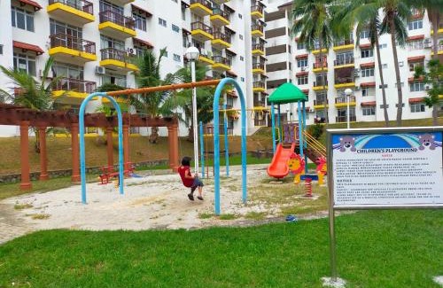 Tanjung Tanah Merah Apartment | Family-Friendly Homestay with Ocean Views at Laguna Condo