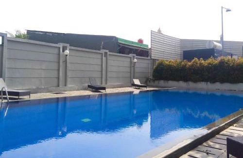 Jakarta Apartment | Cozy Studio @ Tifolia Apartment with Pool Access