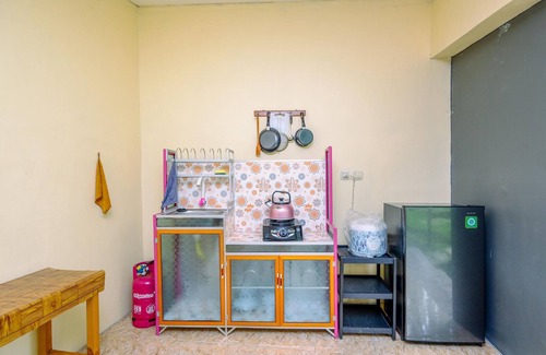 Caringin Apartment | Homey And Simply Studio At Graha Wishnu Guest House
