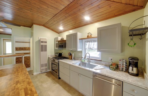 Alto Cottage | Inviting Lakefront Retreat with Boat Dock and Fire Pit