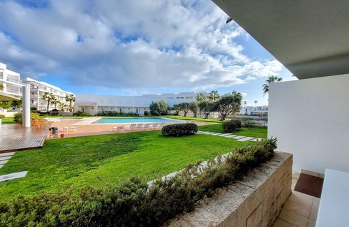 Telheiro Apartment | Inviting Luxury Apartment with Pool Access Near Beach