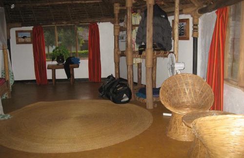 Moshi Hotel | Relax at Honey Badger Lodge with Pool & Spa Amenities