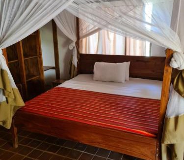 Moshi Hotel | Relax at Honey Badger Lodge with Pool & Spa Amenities