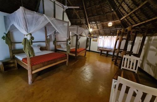 Moshi Hotel | Relax at Honey Badger Lodge with Pool & Spa Amenities