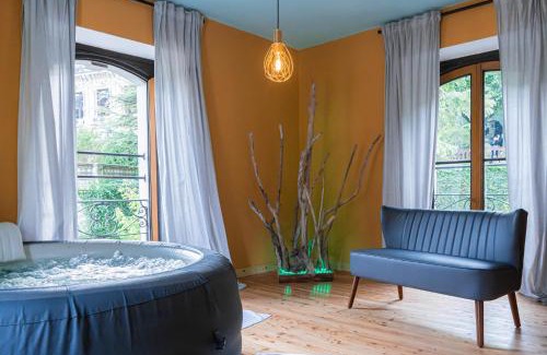 San Pellegrino Terme Apartment | Relax at Exclusive Liberty Spa with Inviting Pool Access