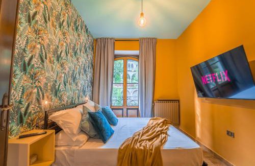 San Pellegrino Terme Apartment | Relax at Exclusive Liberty Spa with Inviting Pool Access