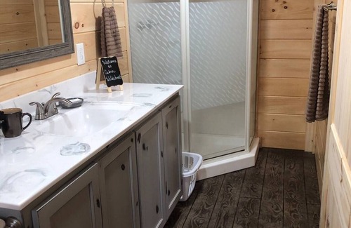 Huron Cabin | Cozy Hopping Kangaroo Cabin Steps from Safari Park