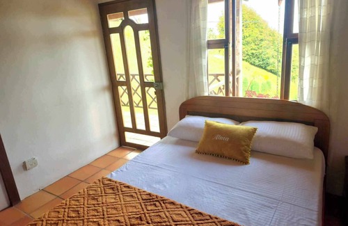 Medellin Bed & Breakfast | Cozy Stay at Hospedaje Medellin-Santa Elena with Spa & Hot Tub