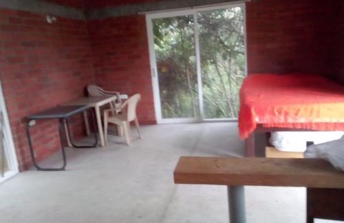 Guarne Cabin | Rural Getaway at Hospedaje Misia Emilia - Family & Pet Friendly