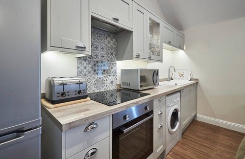 Newbrough Apartment | Welcoming Getaway at The Granary, Carr Edge