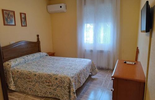 Ocana House | Budget-Friendly Stay at Hostal Ávila with Family & Pets Welcome