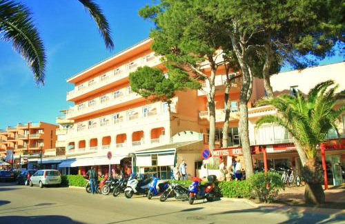 Cala Agulla Hotel | Oceanfront Hostal Alcina: Poolside Relaxation Awaits